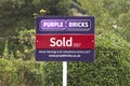 Purple Bricks - UK online estate agent sign Royalty Free Stock Photo